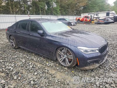 Czwarte zdjęcie samochodu z boku: 2016 BMW 750 XI VIN:WBA7F2C59GG416191 - miniatura