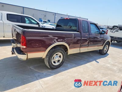 Trzecie zdjęcie samochodu z tyłu: 2000 FORD F150 VIN:1FTRX17L2YKA72908 - miniatura
