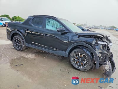 Czwarte zdjęcie samochodu z boku: 2022 HYUNDAI SANTA CRUZ SEL PREMIUM VIN:5NTJDDAF3NH015543 - miniatura
