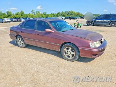 Czwarte zdjęcie samochodu z boku: 1999 TOYOTA AVALON XL VIN:4T1BF18B8XU322399 - miniatura