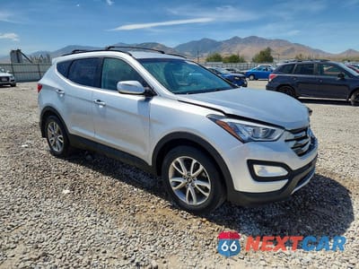 Czwarte zdjęcie samochodu z boku: 2015 HYUNDAI SANTA FE SPORT 2.0T VIN:5XYZUDLA8FG300508 - miniatura