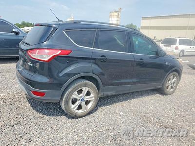 Trzecie zdjęcie samochodu z tyłu: 2014 FORD ESCAPE SE VIN:1FMCU0GX3EUA92771 - miniatura