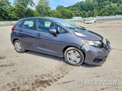 Czwarte zdjęcie samochodu z boku: 2019 HONDA FIT LX VIN:3HGGK5H4XKM701255 - miniatura