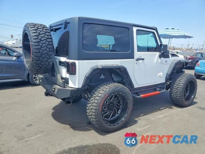 Trzecie zdjęcie samochodu z tyłu: 2014 JEEP WRANGLER RUBICON VIN:1C4BJWCG9EL102551 - miniatura