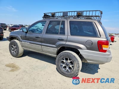 Drugie zdjęcie samochodu z przodu: 1999 JEEP GRAND CHEROKEE LAREDO VIN:1J4GW58S5XC687799 - miniatura