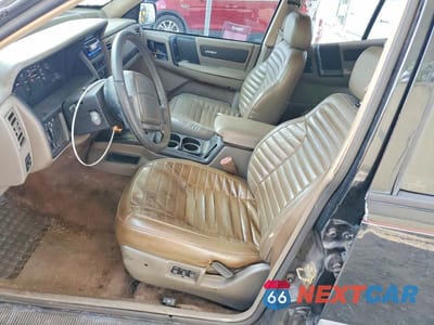 Zdjęcie 7 z 13 samochodu: 1994 JEEP GRAND CHEROKEE LAREDO VIN:1J4FX58S7RC283897 - miniatura