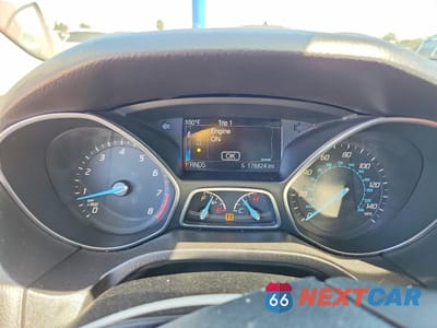 Zdjęcie 9 z 13 samochodu: 2014 FORD FOCUS TITANIUM VIN:1FADP3N21EL281729 - miniatura