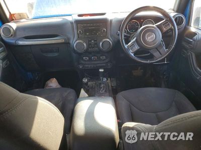 Zdjęcie 8 z 13 samochodu: 2015 JEEP WRANGLER UNLIMITED SPORT VIN:1C4BJWKG9FL533605 - miniatura