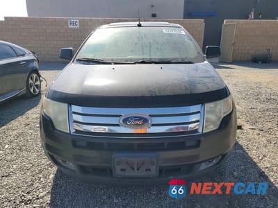 Piąte zdjęcie samochodu w środku: 2010 FORD EDGE SEL VIN:2FMDK3JC4ABA12413 - miniatura