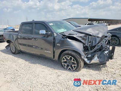 Czwarte zdjęcie samochodu z boku: 2026 RAM 1500 LARAMIE VIN:1C6SRFJT1TN290225 - miniatura