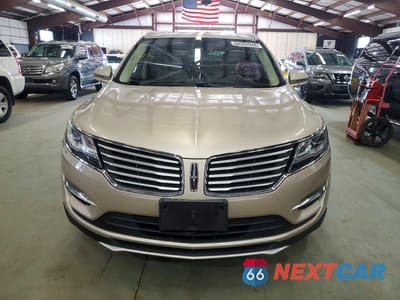 Piąte zdjęcie samochodu w środku: 2017 LINCOLN MKC SELECT VIN:5LMCJ2D95HUL62174 - miniatura