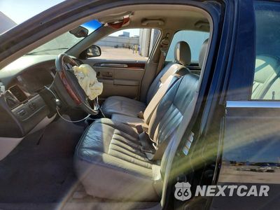 Zdjęcie 7 z 12 samochodu: 2003 LINCOLN TOWN CAR EXECUTIVE VIN:1LNHM81W13Y612265 - miniatura