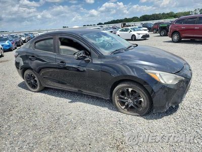 Czwarte zdjęcie samochodu z boku: 2016 SCION IA BASE VIN:3MYDLBZV8GY143203 - miniatura