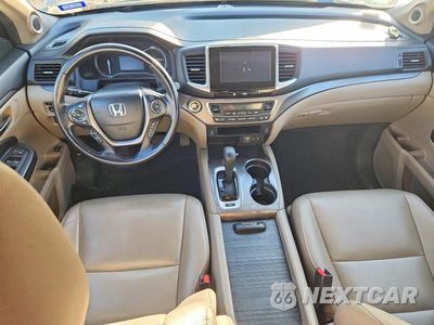Zdjęcie 8 z 13 samochodu: 2017 HONDA PILOT EXL VIN:5FNYF5H54HB043638 - miniatura