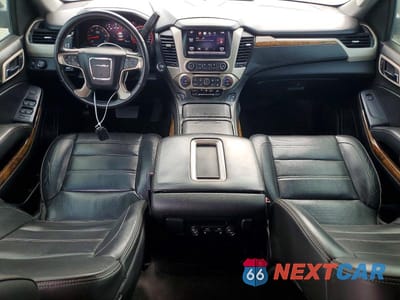 Zdjęcie 8 z 13 samochodu: 2015 GMC YUKON DENALI VIN:1GKS1CKJ9FR176373 - miniatura