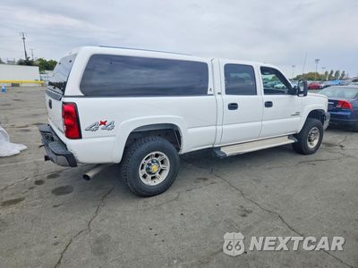 Trzecie zdjęcie samochodu z tyłu: 2004 CHEVROLET SILVERADO K2500 HEAVY DUTY VIN:1GCHK23224F212519 - miniatura