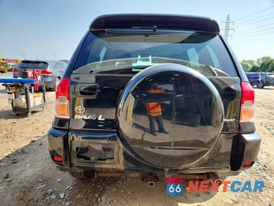 Zdjęcie 6 z 13 samochodu: 2002 TOYOTA RAV4 BASE VIN:JTEGH20V820071167 - miniatura