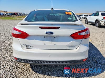 Zdjęcie 6 z 12 samochodu: 2013 FORD FOCUS TITANIUM VIN:1FADP3J25DL263593 - miniatura