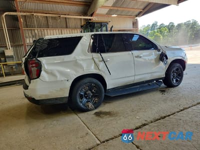Trzecie zdjęcie samochodu z tyłu: 2023 CHEVROLET TAHOE C1500 VIN:1GNSCLED9PR231652 - miniatura