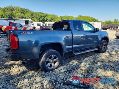 Trzecie zdjęcie samochodu z tyłu: 2015 CHEVROLET COLORADO Z71 VIN:1GCHTCE30F1199374 - miniatura