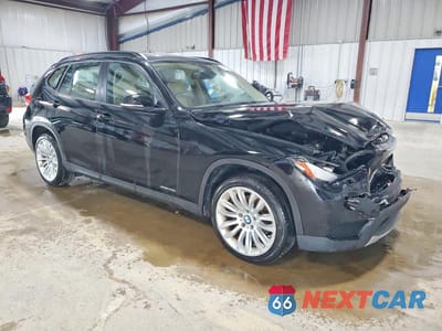 Czwarte zdjęcie samochodu z boku: 2013 BMW X1 XDRIVE28I VIN:WBAVL1C52DVR82811 - miniatura
