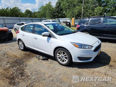 Czwarte zdjęcie samochodu z boku: 2017 FORD FOCUS SE VIN:1FADP3K29HL301346 - miniatura