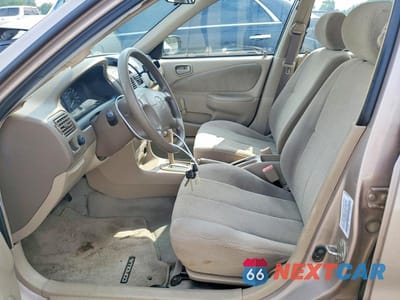 Zdjęcie 7 z 12 samochodu: 2001 TOYOTA COROLLA CE VIN:1NXBR12E31Z546259 - miniatura