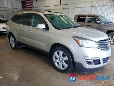Czwarte zdjęcie samochodu z boku: 2016 CHEVROLET TRAVERSE LT VIN:1GNKVGKDXGJ187276 - miniatura