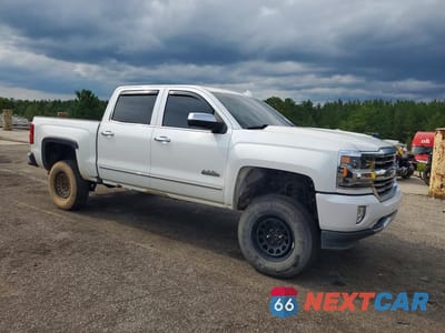 Czwarte zdjęcie samochodu z boku: 2016 CHEVROLET SILVERADO K1500 HIGH COUNTRY VIN:3GCUKTEJ1GG285294 - miniatura
