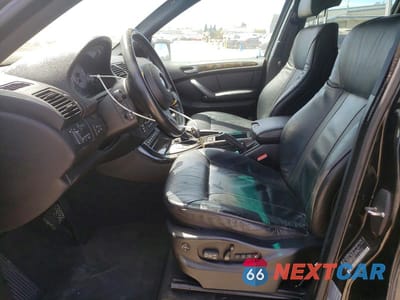 Zdjęcie 7 z 12 samochodu: 2004 BMW X5 4.8IS VIN:5UXFA93524LE81412 - miniatura