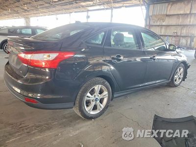Trzecie zdjęcie samochodu z tyłu: 2012 FORD FOCUS SE VIN:1FAHP3F28CL351658 - miniatura