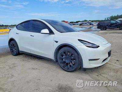 Czwarte zdjęcie samochodu z boku: 2022 TESLA MODEL Y VIN:7SAYGDEE7NF481662 - miniatura