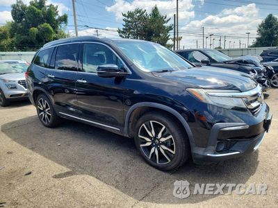 Czwarte zdjęcie samochodu z boku: 2020 HONDA PILOT ELITE VIN:5FNYF6H02LB019910 - miniatura