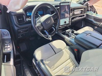 Zdjęcie 8 z 13 samochodu: 2023 FORD F150 LIGHTNING PRO VIN:1FT6W1EVXPWG20834 - miniatura