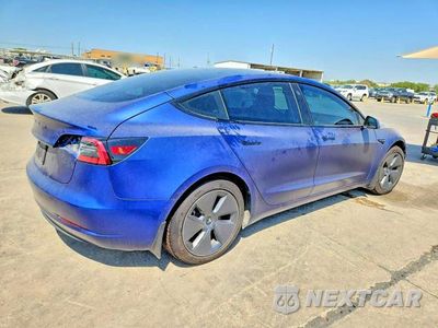 Trzecie zdjęcie samochodu z tyłu: 2023 TESLA MODEL 3 VIN:5YJ3E1EA6PF385078 - miniatura
