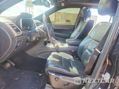 Zdjęcie 7 z 13 samochodu: 2014 JEEP GRAND CHEROKEE SUMMIT VIN:1C4RJFJG2EC531614 - miniatura
