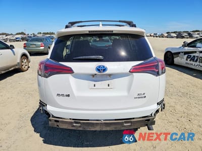 Zdjęcie 6 z 14 samochodu: 2018 TOYOTA RAV4 HYBRID XLE VIN:JTMRJREVXJD158188 - miniatura