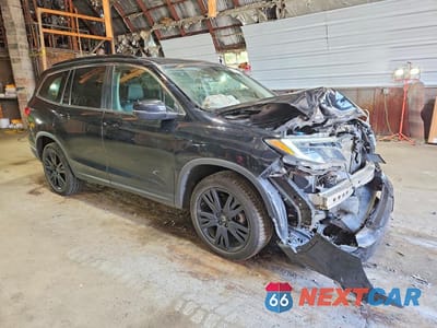 Czwarte zdjęcie samochodu z boku: 2021 HONDA PILOT SE VIN:5FNYF6H2XMB012044 - miniatura
