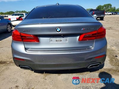 Zdjęcie 6 z 12 samochodu: 2018 BMW M550XI VIN:WBAJB9C5XJB035853 - miniatura
