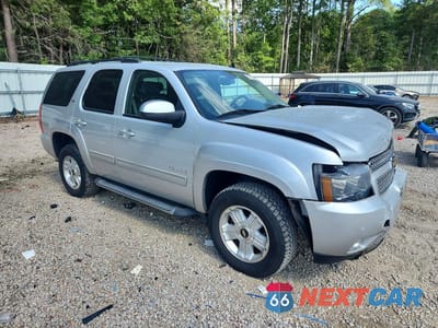 Czwarte zdjęcie samochodu z boku: 2010 CHEVROLET TAHOE K1500 LT VIN:1GNUKBE05AR122065 - miniatura