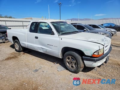 Czwarte zdjęcie samochodu z boku: 2002 DODGE DAKOTA SPORT VIN:1B7GL32XX2S708622 - miniatura