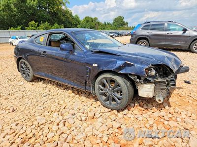 Czwarte zdjęcie samochodu z boku: 2006 HYUNDAI TIBURON GT VIN:KMHHN65F16U190487 - miniatura