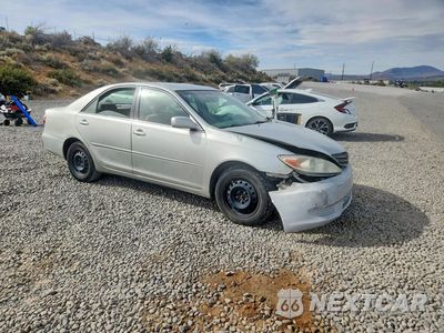 Czwarte zdjęcie samochodu z boku: 2002 TOYOTA CAMRY LE VIN:JTDBE30K120107672 - miniatura