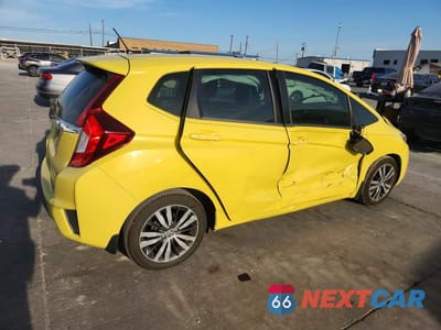 Trzecie zdjęcie samochodu z tyłu: 2015 HONDA FIT EX VIN:3HGGK5H80FM770528 - miniatura