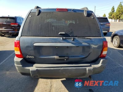 Zdjęcie 6 z 13 samochodu: 2001 JEEP GRAND CHEROKEE LAREDO VIN:1J4GX48S21C702810 - miniatura
