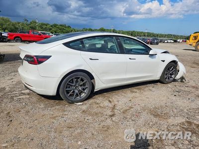 Trzecie zdjęcie samochodu z tyłu: 2023 TESLA MODEL 3 VIN:5YJ3E1EA4PF489469 - miniatura