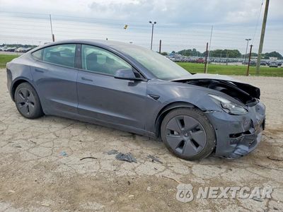 Czwarte zdjęcie samochodu z boku: 2022 TESLA MODEL 3 VIN:5YJ3E1EB1NF206807 - miniatura