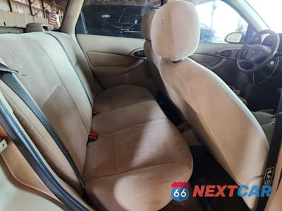 Zdjęcie 11 z 13 samochodu: 2000 FORD FOCUS SE VIN:1FAFP3630YW229639 - miniatura