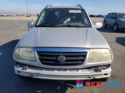 Piąte zdjęcie samochodu w środku: 2002 SUZUKI GRAND VITARA JLS LIMITED VIN:JS3TE62V824150963 - miniatura
