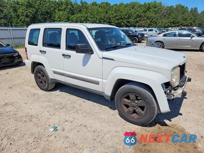 Czwarte zdjęcie samochodu z boku: 2011 JEEP LIBERTY SPORT VIN:1J4PN2GK5BW566636 - miniatura